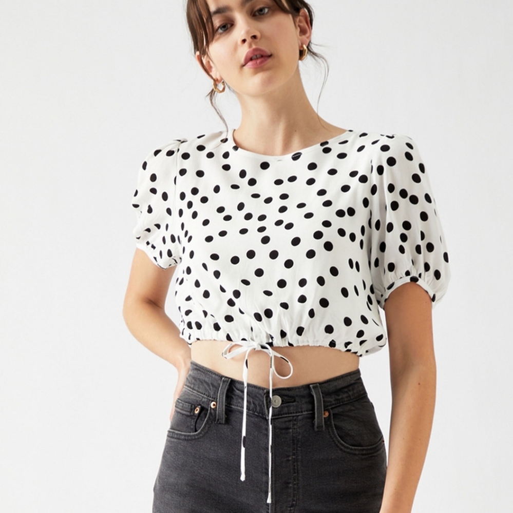 Charlie Holiday the Holiday top features puff sleeves, a round neckline, drawstr